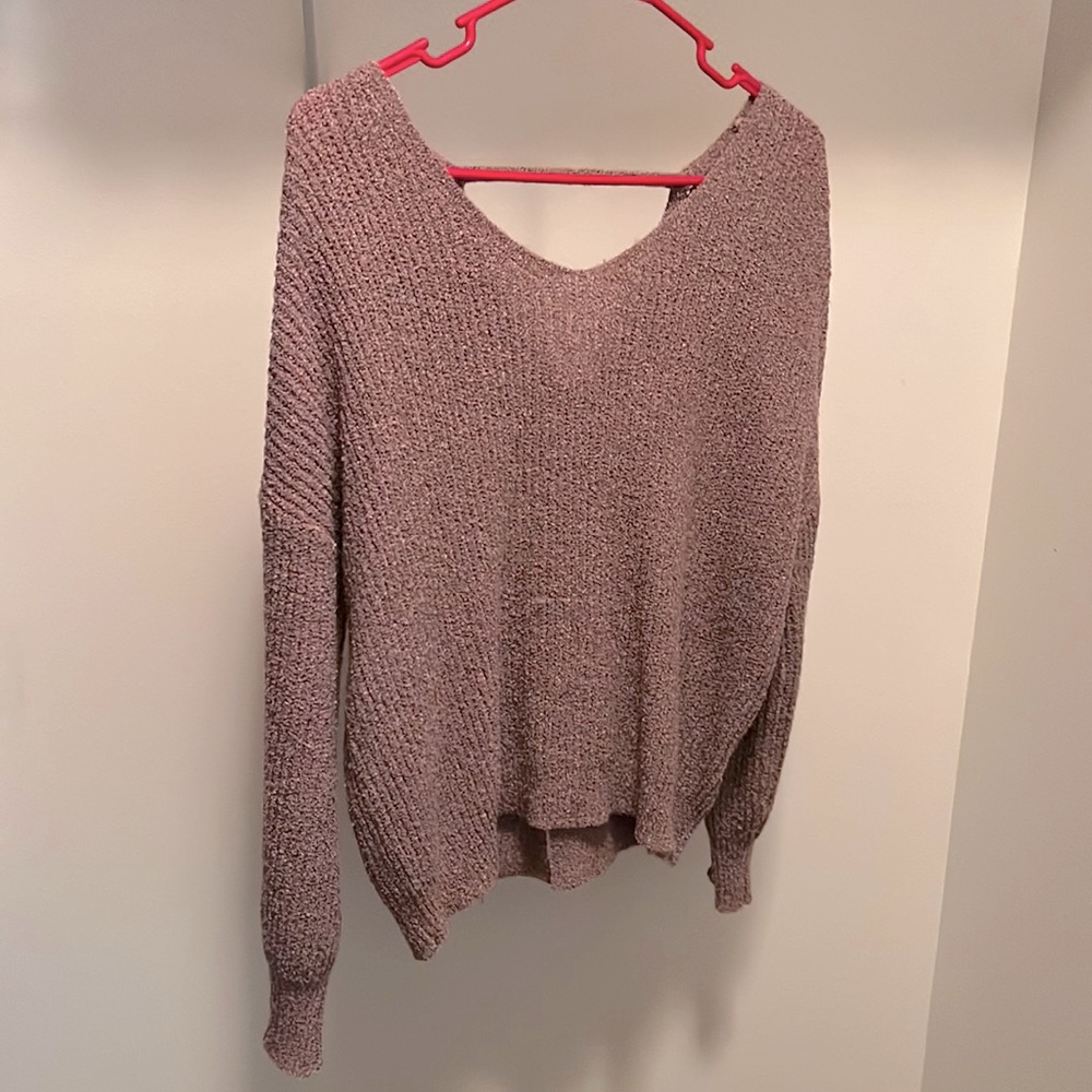 Pink sweater with low top tie up back